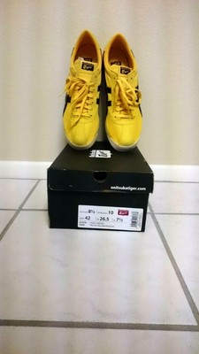 black and yellow tiger shoes